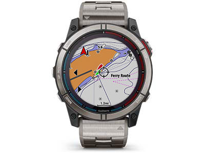 a silver watch with a blue and red face