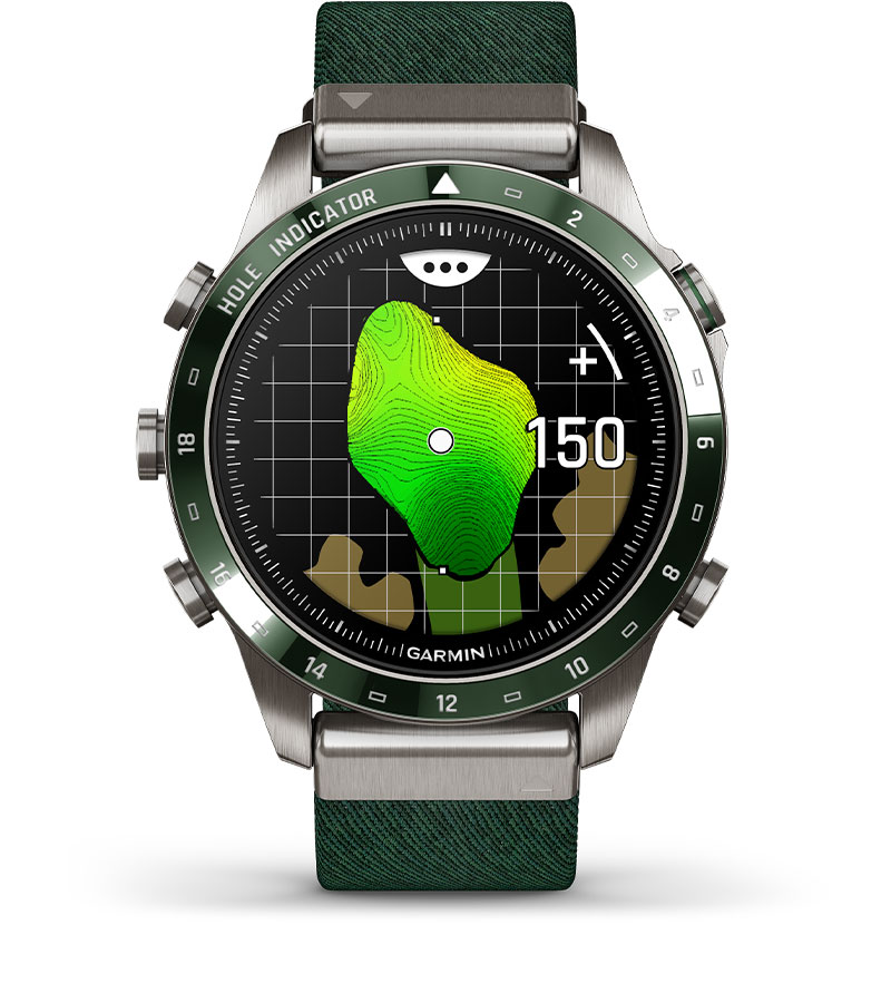a watch with a green face