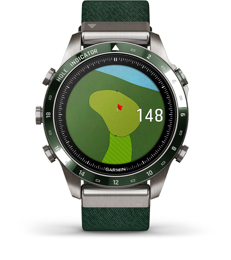 a watch with a green and black face