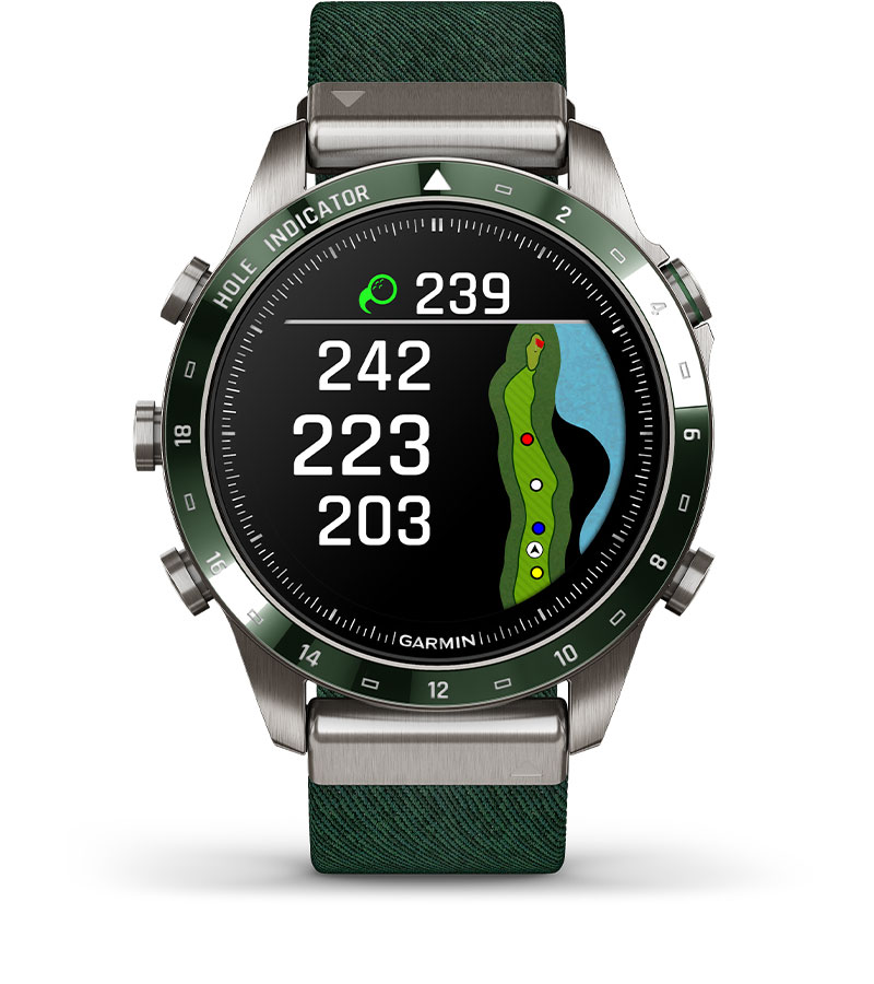 a watch with a green face